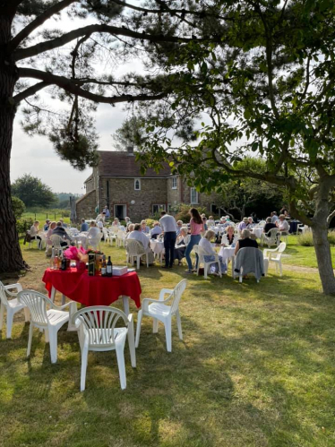 Photo of local members at our garden party